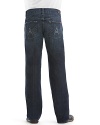 7 For All Mankind bootcut jeans. In a dark wash with slight fading and distressing. Zip fly and button closure. Back pocket features 7 for All Mankind's classic A embroidery. Zip fly.