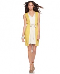 T Tahari's petite dress is full of on-trend design details, from its colorblocked front to its boxy cutaway hem. A cinchable drawstring belt gives great definition!