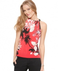 T Tahari enlivens this petite halter-neck top with a tropically inspired floral print and a shot of bright color. Its vibrant hue is the perfect way to perk up a blazer and a pair of black pants.