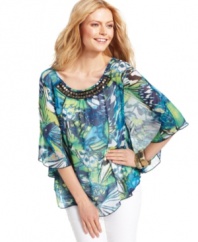 Style&co.'s petite top features an exotic print and a flowy silhouette that's universally flattering. A beaded neckline adds extra oomph. (Clearance)