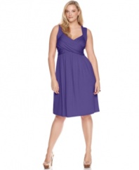 A crisscross front lends an elegant line to Spense's sleeveless plus size dress, accentuated by an empire waist-- look amazing from day to play!