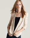 A striped Rebecca Minkoff blazer flaunts a pointed hem for a modern topping to work and weekend staples. Rendered in luxurious, lightweight silk, the tonal look lends instant sophistication to your every day.
