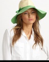 A sweet topper with a colorblock brim and bow that keeps the sun out of your eyes. Viscose/paperBrim, about 4Imported
