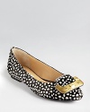 Make a spotty statement in DIANE von FURSTENBERG's Madison flats, luxe in printed haircalf with brushed hardware.