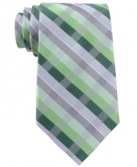 Get on the grid. This silk tie from Michael Kors is a visually stunning graphic in a fresh palette.