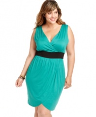 Looking slim is a cinch with Soprano's sleeveless plus size dress, accentuated by a banded empire waist.