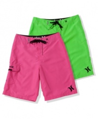Get glowing. Take a step outside of the box and really standout with a pair of these colorful board shorts from Hurely.