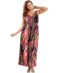Be bold and beautiful in Calvin Klein's sleeveless plus size maxi dress, broadcasting a vivacious print!