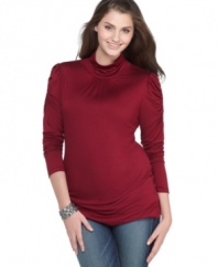 Ruched sleeves lend a modern feel to Soprano's plus size turtleneck sweater-- team it with your fave jeans!