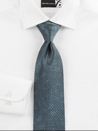 A savvy, sophisticated look woven in Italian silk, with a geometric pattern detail.SilkDry cleanMade in Italy