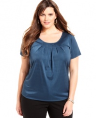 A pleated neckline lends a sophisticated accent to Jones New York Collection's short sleeve plus size top-- dress it up with trousers or down with denim.