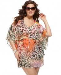Get wild in J Valdi's plus size cover up. Mixed prints make this tunic a must-have for the beach and pool!