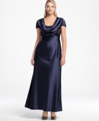 Eliza J's captivating plus size satin gown is a vision with its delicate lace details and fully buttoned back (which  cleverly disguises a more convenient zipper). You're sure to be stunning in this sweeping, royal wedding-inspired dress.
