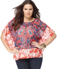 Refresh your casual look for the season with MICHAEL Michael Kors' batwing sleeve plus size top, showcasing a vibrant mixed print.
