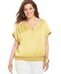 Lend a polished finish to your casual looks with Alfani's short sleeve plus size top, punctuated by a smocked hem.