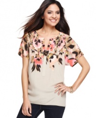 A soft, billowing fit offsets the chic floral print and edgy studs of Style&co.'s petite top.