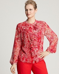 A vivid snake print is utterly charming on this Jones New York Collection blouse, styled with a ruffled placket for feminine flair.