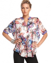 Mixed prints give this petite blouse from Calvin Klein a fashion-forward twist, while the sheer, floral patterned silhouette is spot-on for spring. (Clearance)