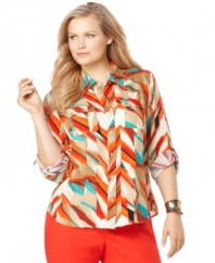 Add a blast of color to your casual look with Calvin Klein's roll tab sleeve plus size blouse, flaunting a vibrant print.