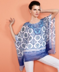 Style&co.'s petite top is ready for the season ahead with a spellbinding print and fabulous, poncho-like fit. Pair with slim white pants and wedges for a beautifully breezy look.