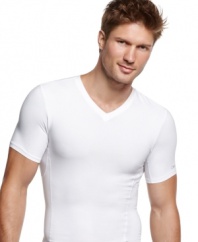 Comfortable enough to wear every day, this slimming compression t shirt from Calvin Klein visibly flattens your midsection for a sleek silhouette.