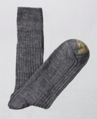 Dress the part from the bottom up with these comfortable and refined wool socks. Ribbed for comfort and fit, they have a handsome, tonal heathered color. Sold in three packs of one color.