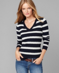 Cozy up to this cable-knit sweater by Tommy Hilfiger. A luxe and preppy look has never been so affordable!