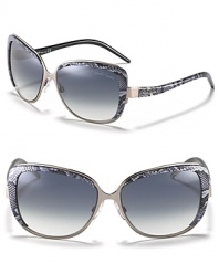 Up the style ante in round cat eye sunglasses with snake printed sides and gradient lenses.