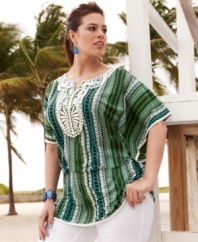 Revitalize your neutral bottoms with Style&co.'s butterfly sleeve plus size top, finished by a vivid print and crochet detail.