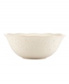 With fanciful beading and a feminine edge, this serving bowl from the Lenox French Perle white dinnerware collection has an irresistibly old-fashioned sensibility. Hard-wearing stoneware is dishwasher safe and, in a soft white hue with antiqued trim, a graceful addition to every meal. Qualifies for Rebate