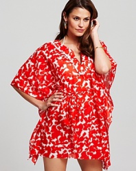 Put a preppy spin on your poolside portfolio with this printed pom-pom trimmed coverup from Milly. It pops over your favorite suit, lending your beach-to-boardwalk look a