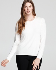 Effortless elegance abounds in everyday looks with this silk Eileen Fisher Plus tee. Layer year round with your favorite accessories.