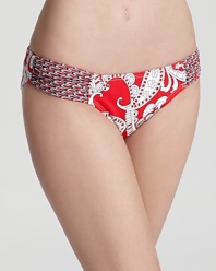 Tommy Bahama designs all its suits with figure flattery in mind. This paisley printed bottom boasts full coverage and a bright hue to guarantee you stand out poolside.