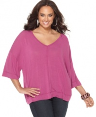 Make a cool exit with Cable & Gauge's three-quarter sleeve plus size sweater, featuring a buttoned up back.