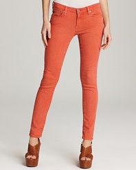 A petite dot print infuses these AG Adriano Goldschmied skinny jeans with major charm.