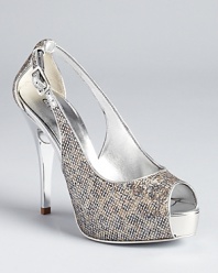 A subtle leopard print gets dressed up with a glimmering, glitter-like texture on GUESS's alluring Hondola platforms.
