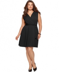 Look red hot in NY Collection's sleeveless plus size dress, featuring a faux wrap design for a slenderizing silhouette.