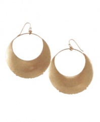 You'll be over the moon for this stellar style. Jessica Simpson's chic cut-out hoops resemble a glowing moon in gold tone mixed metal. Approximate drop: 2 inches.
