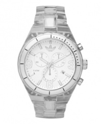 Nothing to hide. Lay it on all the line with this clear watch by adidas. Clear nylon plastic bracelet and round case. Silver tone bezel with white nylon insert. White chronograph dial features applied silver tone numerals at three, six and nine o'clock, stick indices, minute track, date window at four o'clock, three subdials, luminous hands and logo. Quartz movement. Water resistant to 50 meters. Two-year limited warranty.