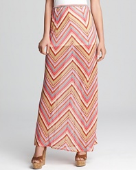 This breezy Element maxi skirt delivers fresh summer style with vibrant stripes and subtle sheerness from the mid-thigh down.