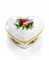From the heart. A few winds of this Royal Albert musical jewelry box fills your home with the beloved melody, If You Love Me. Inspired by an English country garden, this charming keepsake is graced with a delicate floral motif and stows tiny treasures near and dear. Hinged, with gold banding.
