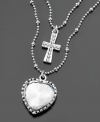 Finer fashion by Betsey Johnson. This double-strand, silvertone mixed metal necklace features sparkling heart and cross pendants. Approximate outer chain length: 18 inches. Approximate inner chain length: 14 inches, plus 2-1/2 inch extender. Approximate drop: 1-1/2 inches.