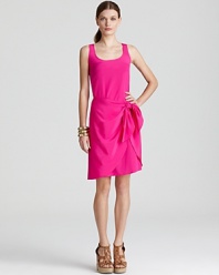 Amp up your everyday repertoire in this fuchsia DKNY dress. Punctuate the neon silhouette with acid-bright accents for a maximum impact ensemble.