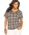 Snag spot-on style with AGB's short sleeve plus size top, featuring a leopard print and beaded neckline.