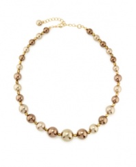 A gorgeous array of brown-hued graduated imitation pearls adorn this lovely, ladylike necklace from Charter Club. Crafted in gold tone mixed metal. Approximate length: 16 inches + 2-inch extender.