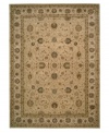 Introduce a combination of elegant Persian and European designs to your traditional home décor with this remarkable Nourison area rug. Hand-tufted with exceptional technique, this natural wool area rug features strands of genuine silk for exquisite detail that redefines luxury.