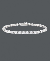 Streamline your style with a hint of sparkle. B. Brilliant's luminous tennis bracelet features a row of round-cut cubic zirconias (8-1/4 ct. t.w.) set in sterling silver. Approximate length: 7-1/4 inches.