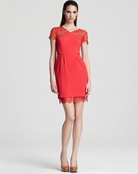 Romantic lace goes hyper-modern in this BCBGMAXAZRIA dress, fashioned in the must-have hue of the season.