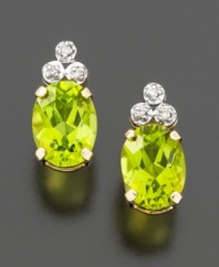 A little burst of vibrant green will sparkle from each ear with these simple peridot stud earrings topped with sparkling diamond accents. Perfect for an August birthday.