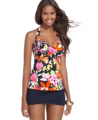 Have more fun in the sun in Anne Cole's floral printed tankini top! The flattering draped details and vibrant colors give it a lush, tropical look.
